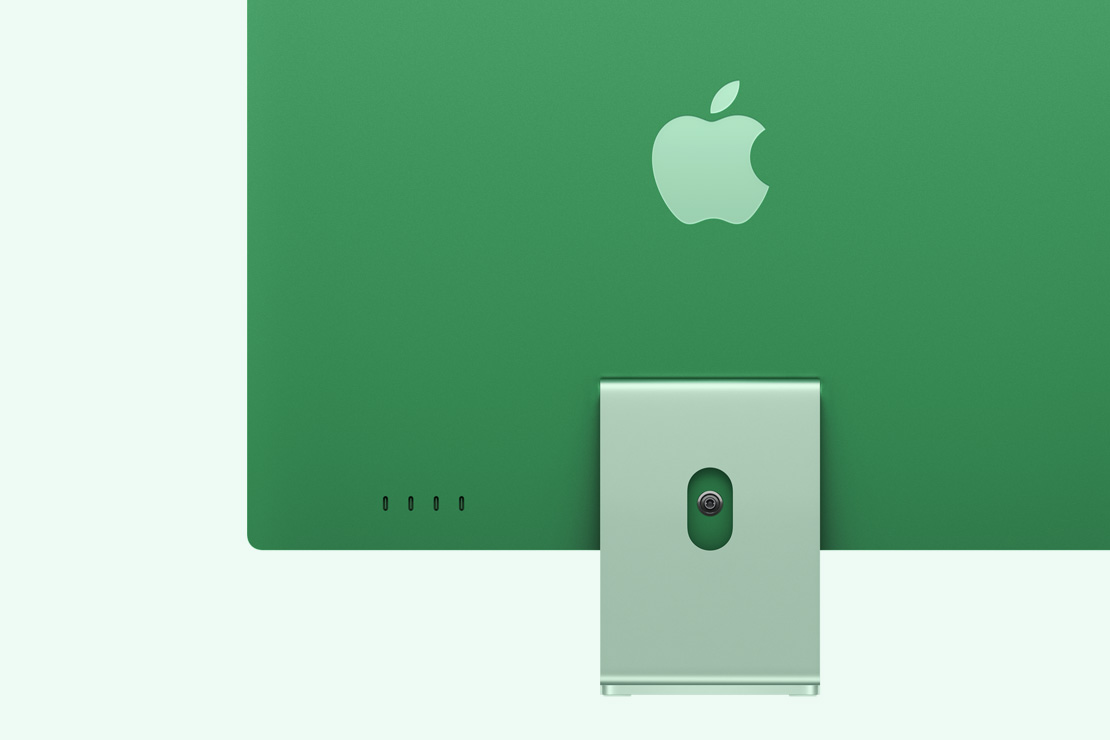 Un iMac verde mostrato da dietro, evidenziando 4 porte USB-C