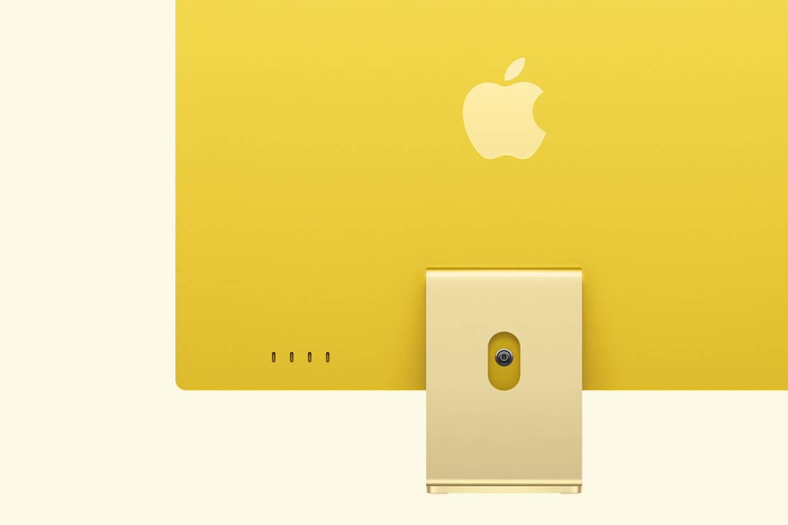 Vista posterior de una iMac amarilla, que destaca los cuatro puertos USB-C