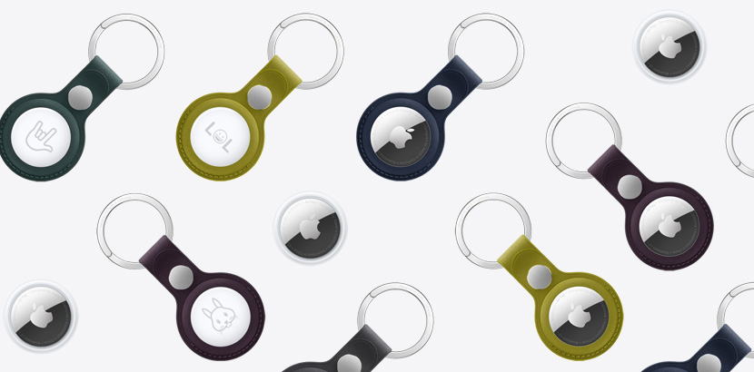 An array of AirTags and AirTags with FineWoven Key Ring in various colours, including Chartreuse, Dark Green, Deep Blue, Blackberry and Black.