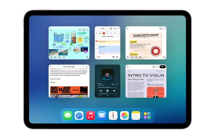 Un iPad, posición horizontal, la pantalla muestra seis ventanas abiertas en dos filas, incluidas las apps Calendario, Notas, Apple Music y Safari